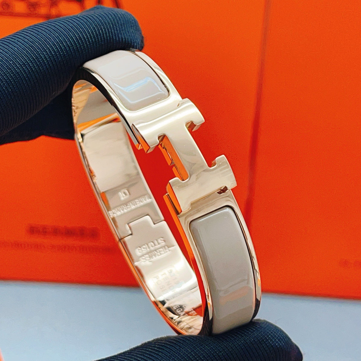Hermès Gray Leather Bracelet with Rose Gold Details