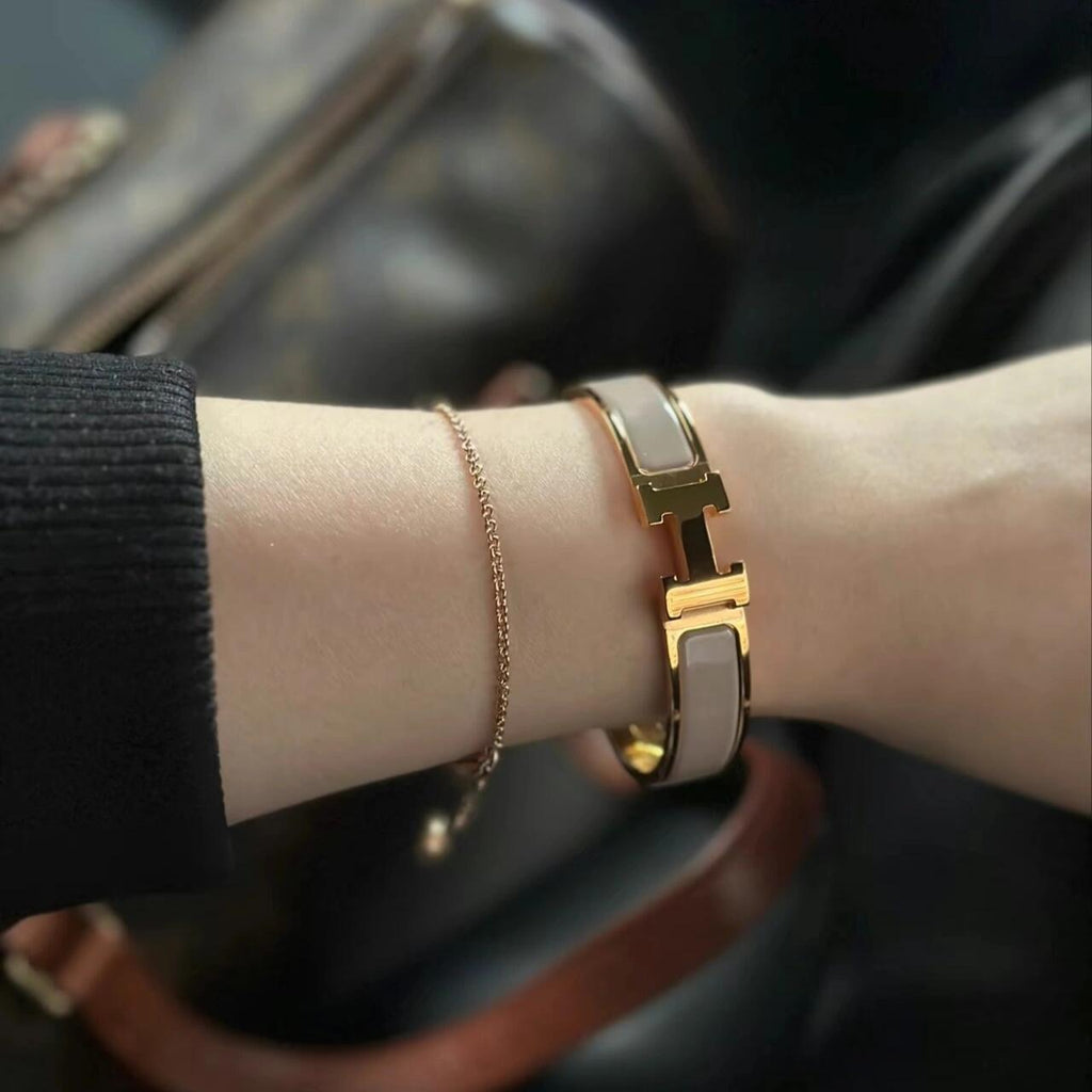Hermès Gray Leather Bracelet with Rose Gold Details