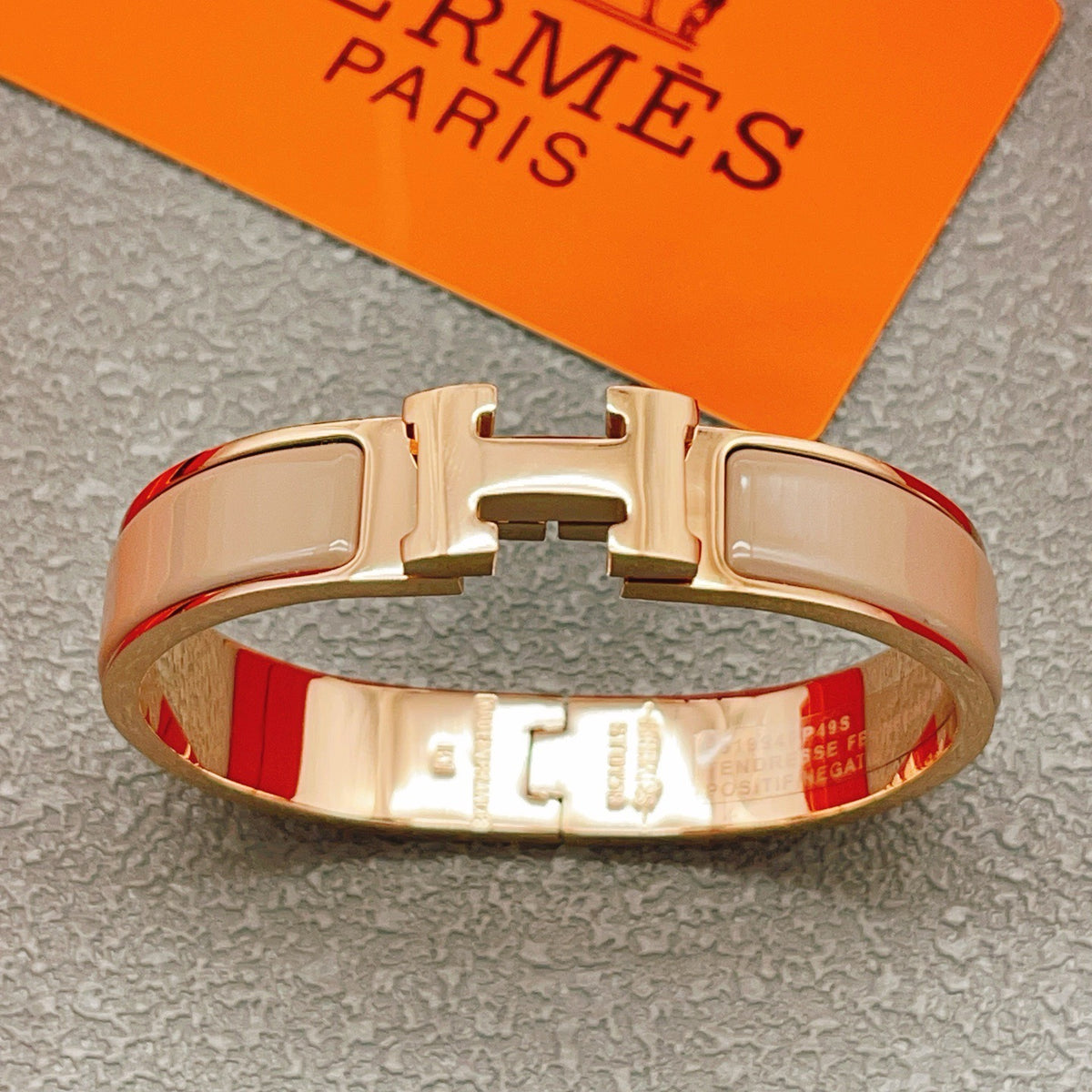 Hermès Gray Leather Bracelet with Rose Gold Details