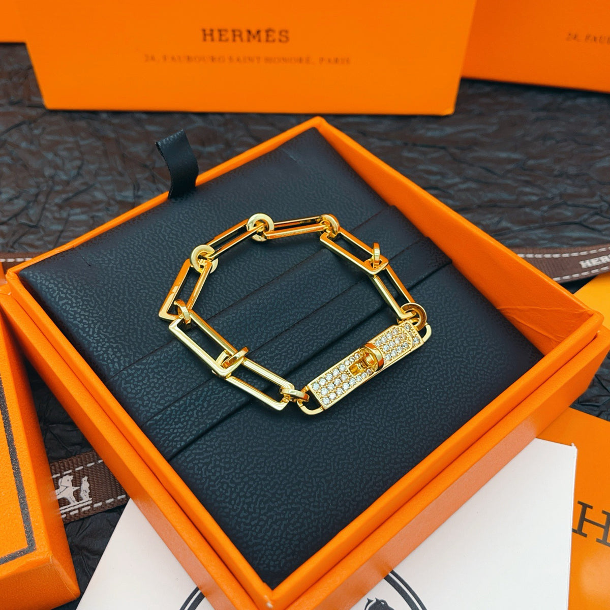 Hermès Gray Leather Bracelet with Rose Gold Details